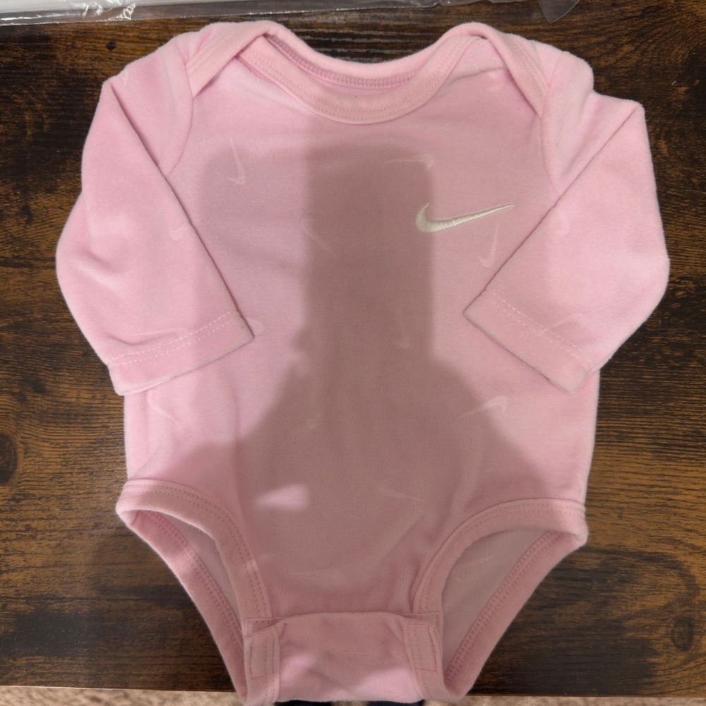 3365 | Nike Swoosh Print Long Sleeve Fleece Bodysuit Pink Newborn